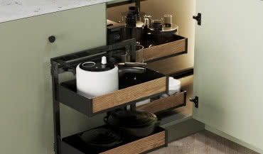 Systemy cargo w szafkach kuchennych: sposób na wygodne przechowywanie